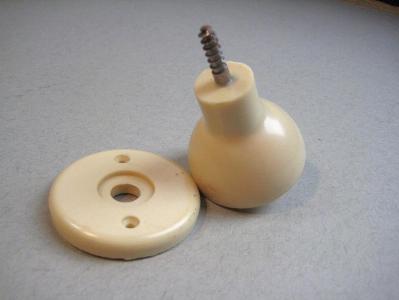 Ivory colour door knob on rose -  select me for a larger image