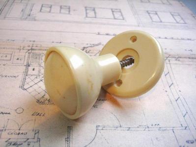 Ivory colour door knob on rose -  select me for a larger image